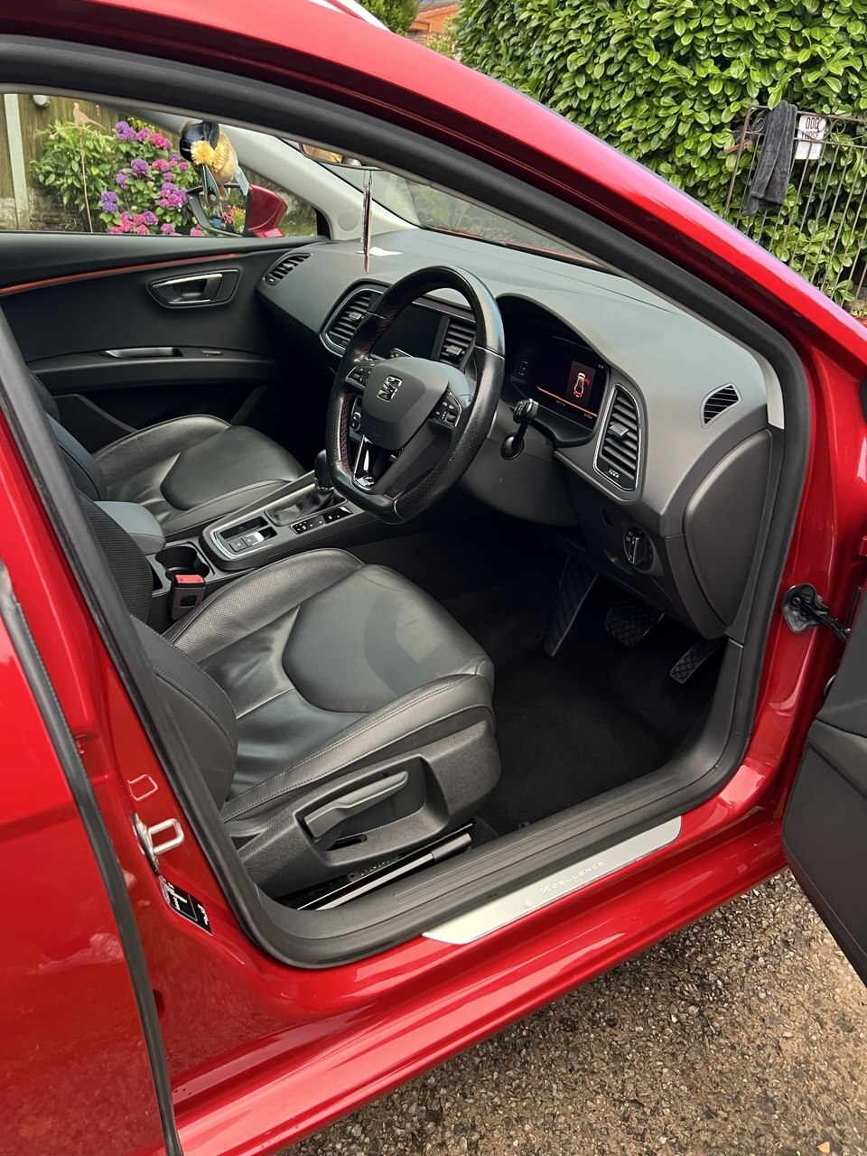 Clean front cabin of Bradley’s red Seat Leon after a Kaizen Deep Clean