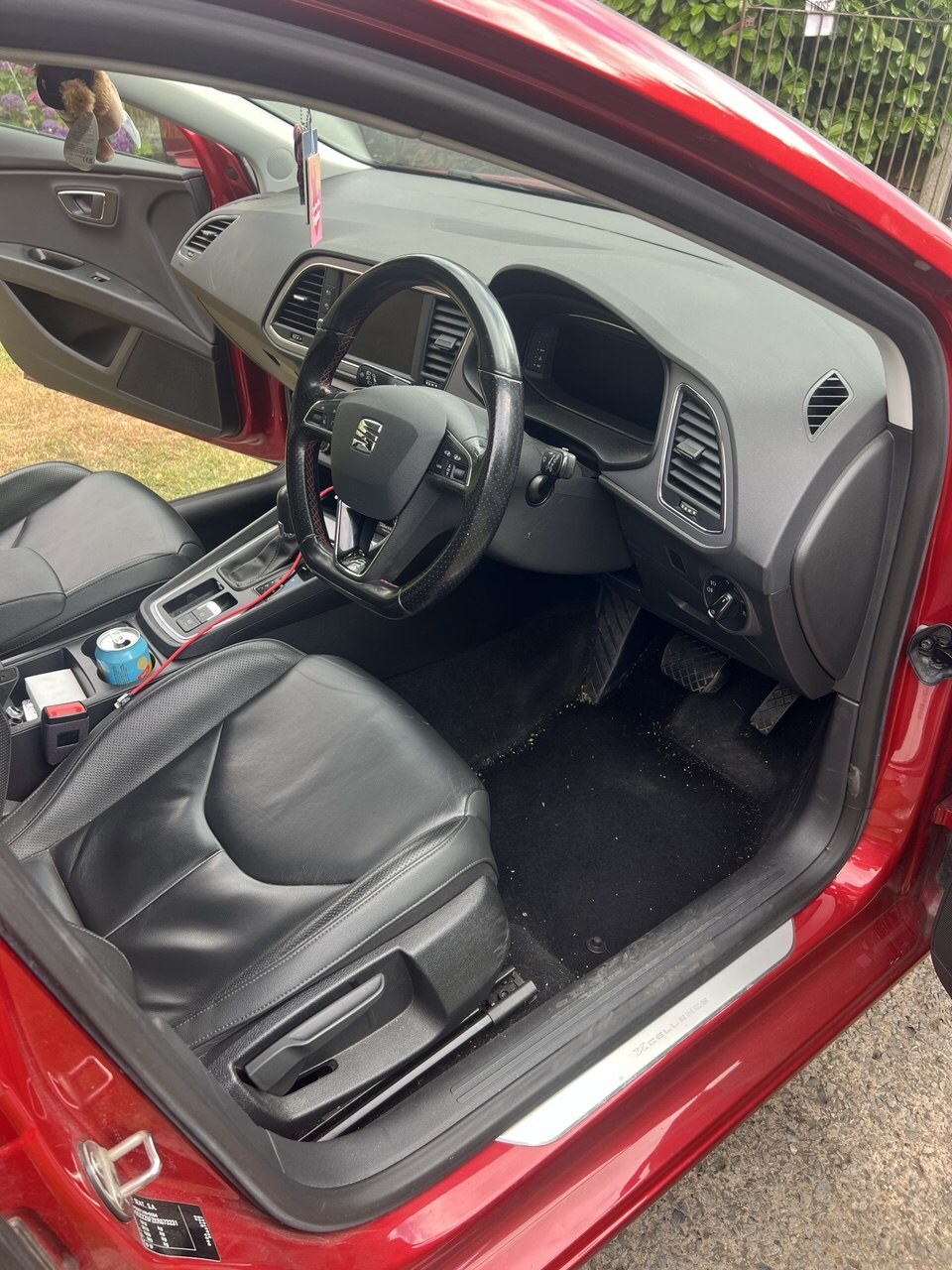 Front cabin of Bradley’s red Seat Leon before a Kaizen Deep Clean